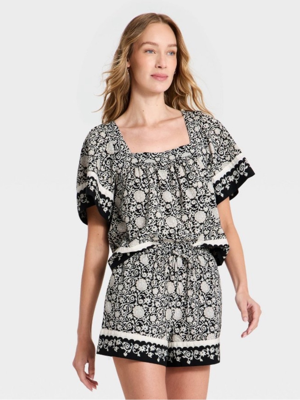NWOT Short Sleeve Black and Cream Floral Top